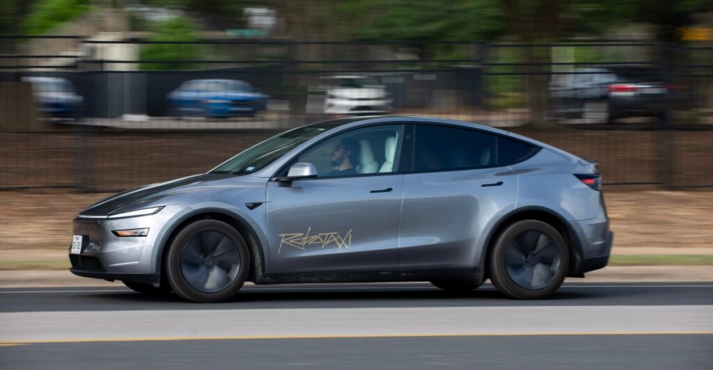 tesla-s-robotaxis-face-scrutiny-amid-regulatory-gaps