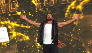 aj-styles-and-kabuki-warriors-celebrate-victory-on-wwe-raw