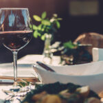 Glass of wine at dining table