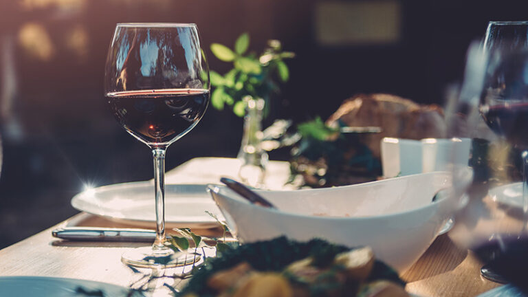 Glass of wine at dining table