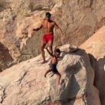 outrage-erupts-as-influencer-throws-son-off-cliff-during-video