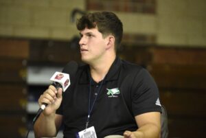 und-s-ben-buxa-shines-at-media-day-embodies-team-vision