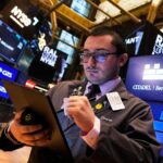 wall-street-divided-as-tech-stocks-tumble-amid-broader-market-gains