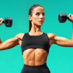 Beautiful,Young,Woman,Doing,Exercises,With,Dumbbells.,Photo,Athletic,Woman