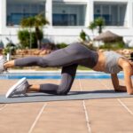 Woman,Is,Performing,A,Fitness,Exercise,On,A,Yoga,Mat