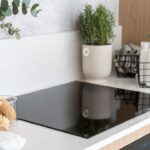 Bottles,Of,Household,Chemicals,In,Metal,Basket,On,Countertop,And
