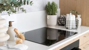 Bottles,Of,Household,Chemicals,In,Metal,Basket,On,Countertop,And