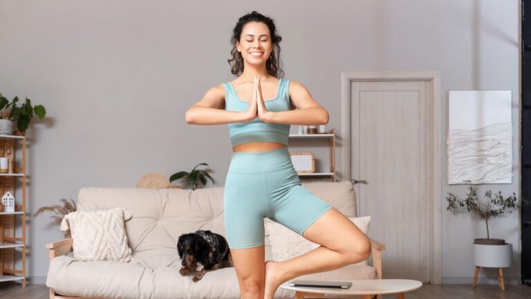 Sporty,Young,African-american,Woman,With,Cocker,Spaniel,Doing,Yoga,At