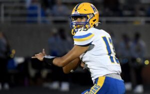 highland-s-aaron-mccormack-shines-in-first-varsity-start-trojans-win