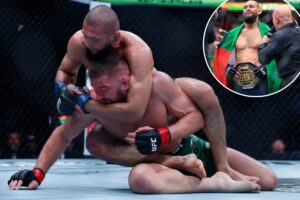 khamzat-chimaev-captures-middleweight-belt-at-ufc-319