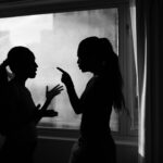 two woman fighting, arguing, having disagreement, blaming, pointing finger, verbal abuse, family relationship problems