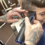 united-way-s-back-to-school-energizer-provides-free-haircuts