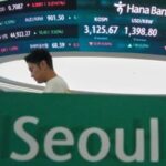 wall-street-dips-ahead-of-key-earnings-and-powell-s-speech