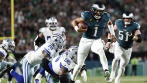 eagles-edge-cowboys-24-20-amid-scandal-and-weather-delay