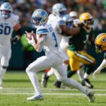Detroit Lions wide receiver Amon-Ra St. Brown (14) catches a pass during an NFL football game between the Detroit Lions and Green Bay Packers Sunday, Sept. 7, 2025, in Green Bay, Wis. (AP Photo/Matt Ludtke)