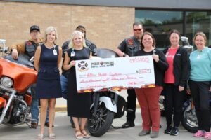 firefighters-motorcycle-club-donates-11-000-to-autism-clinic