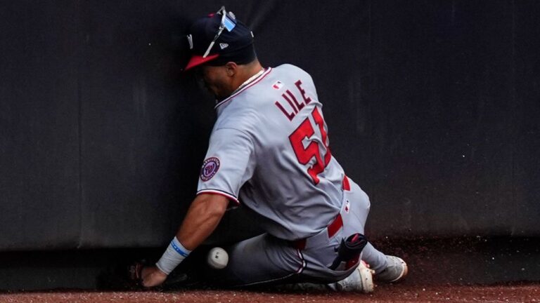 nationals-rookie-daylen-lile-exits-game-with-knee-injury