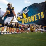saline-football-dominates-dexter-61-34-in-thrilling-showdown