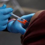 u-s-vaccine-advisers-shift-covid-recommendations-after-divisive-vote