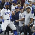 dodgers-surge-with-10-5-victory-over-reds-in-playoff-opener
