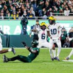 michigan-triumphs-over-michigan-state-31-20-in-rivalry-clash