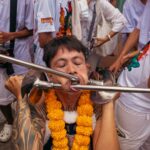 shocking-images-emerge-of-devotees-impaling-faces-at-festival