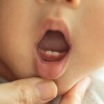 new-study-links-maternal-stress-to-early-teething-in-infants