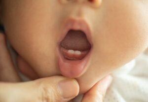 new-study-links-maternal-stress-to-early-teething-in-infants