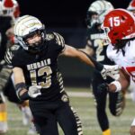 oak-forest-s-andrew-dawson-stars-in-34-20-playoff-victory