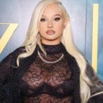 alabama-barker-ignites-social-media-with-daring-red-thong-look