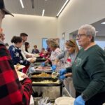 community-christmas-dinner-serves-603-meals-at-victory-lutheran