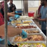 local-volunteers-serve-heartwarming-christmas-dinner-to-shelter-residents