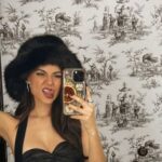 victoria-justice-rocks-black-mini-dress-in-aspen-selfie