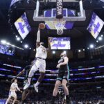 lakers-edge-grizzlies-120-114-as-doncic-shines-with-36-points