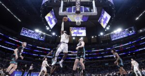 lakers-edge-grizzlies-120-114-as-doncic-shines-with-36-points
