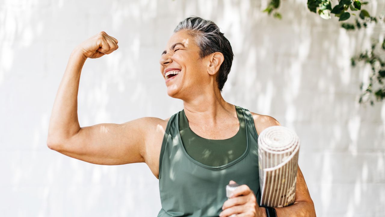 Happy,Elderly,Woman,Celebrating,Her,Fitness,Achievement,After,A,Great