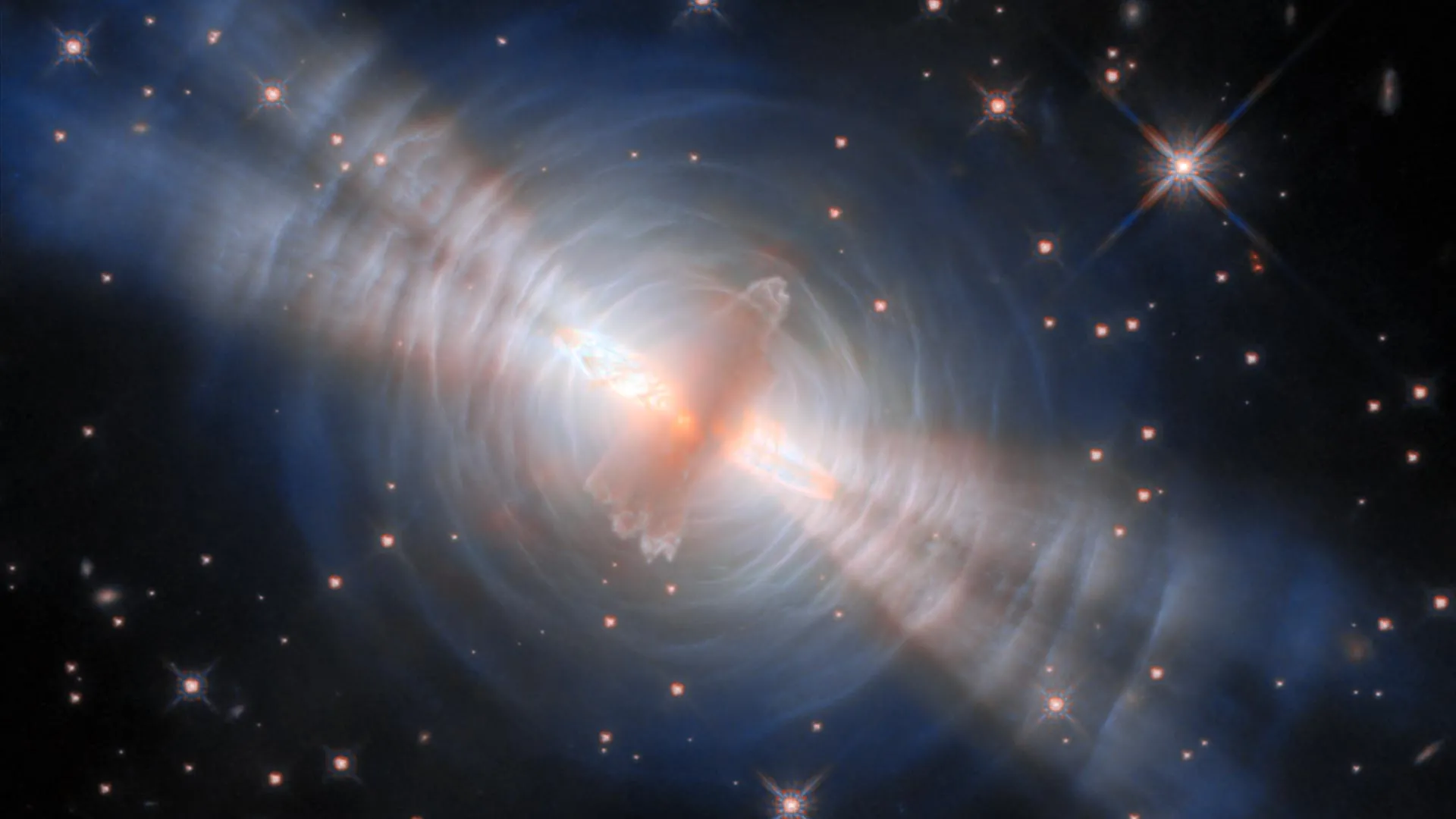 hubble-reveals-stunning-details-of-egg-nebula-s-hidden-star