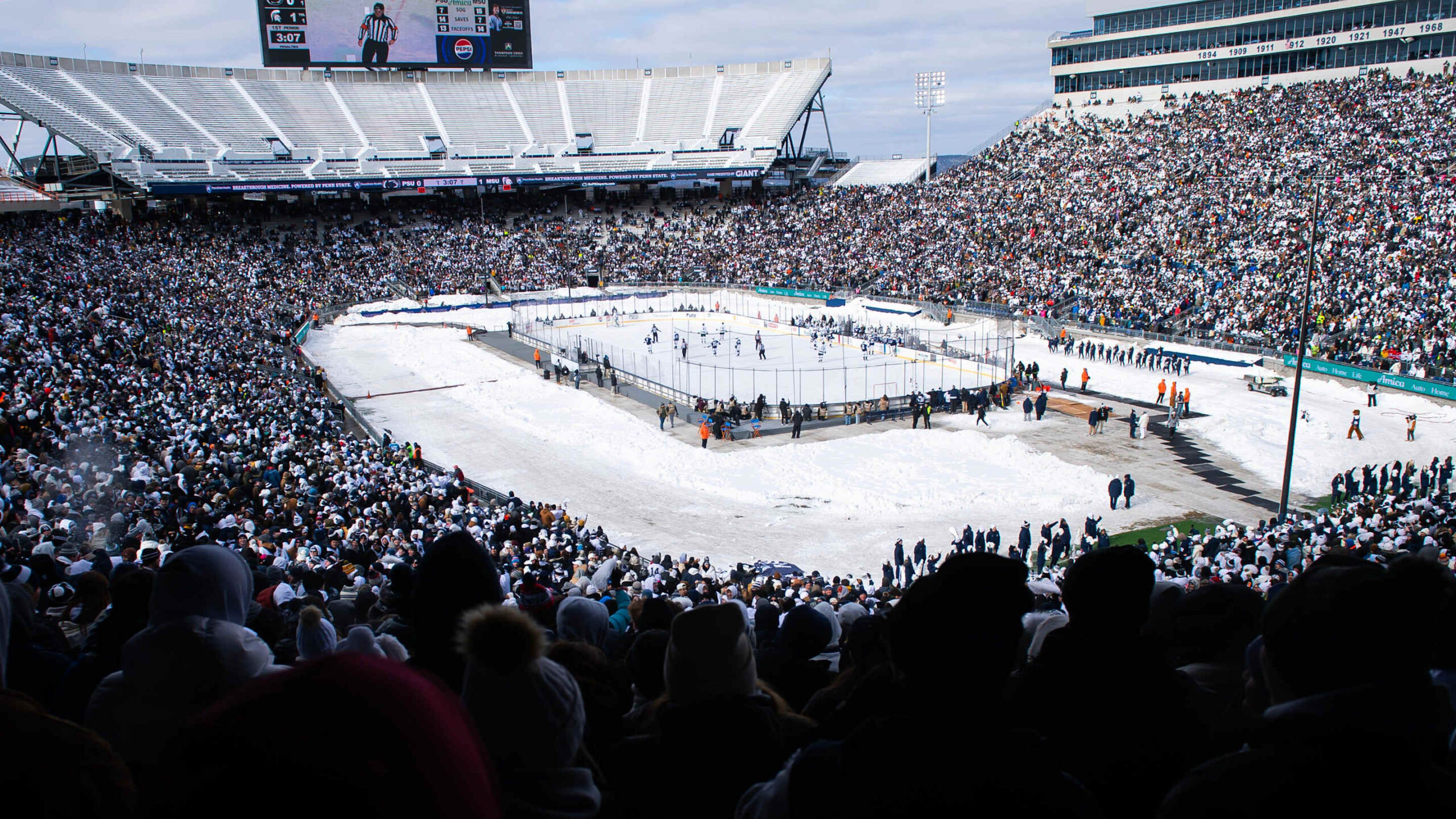 penn-state-hockey-players-celebrate-historic-outdoor-game-at-beaver-stadium